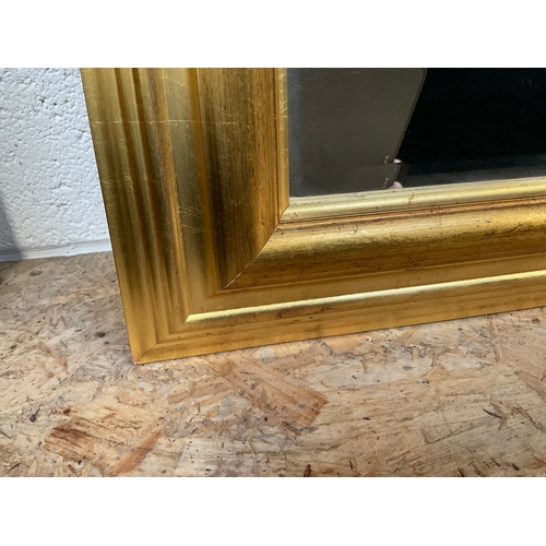 27 - GILT FRAMED WALL MIRROR 28” x 39”