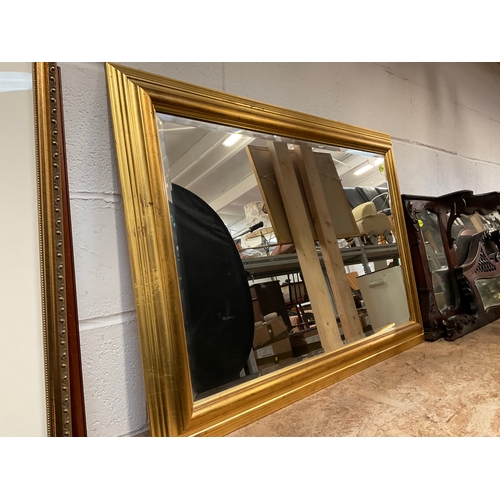 27 - GILT FRAMED WALL MIRROR 28” x 39”