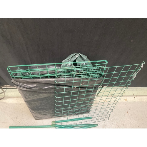 142 - 4  SHELF GARDEN GREENHOUSE WITH PLASTIC COVER NEEDS ASSEMBLY