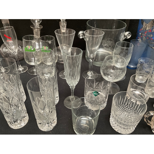 145 - 2 BOXES OF GLASSWARE TO INCLUDE CUT GLASS, DECANTERS, GLASS ICE BUCKET, VASES, COLOURED GLASS WATER ... 