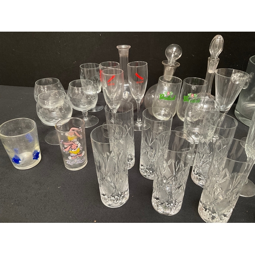 145 - 2 BOXES OF GLASSWARE TO INCLUDE CUT GLASS, DECANTERS, GLASS ICE BUCKET, VASES, COLOURED GLASS WATER ... 