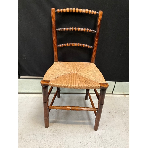 206 - VINTAGE OAK ARMCHAIR WITH LEATHER UPHOLSTERED SEAT AND BACK, MAHOGANY RUSH SEATED CHAIR BADGED LAHOR... 