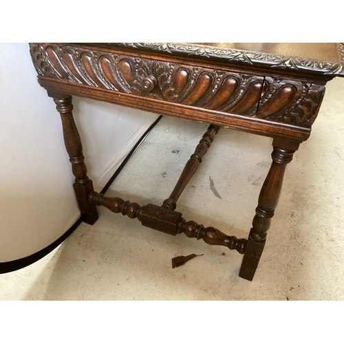 211 - VICTORIAN CARVED CENTRE TABLE WITH STRETCHERED CARVED BASE WITH DRAWER TO END A/F H30” L47” D30”