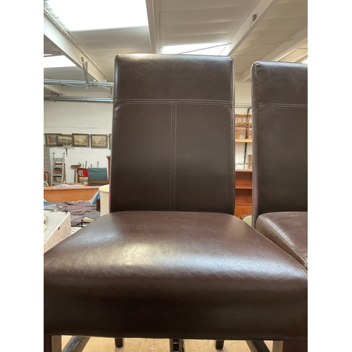 213 - 8 MODERN LEATHERETTE DINING CHAIRS - 4 MATCHING, 3 MATCHING AND 1 OTHER