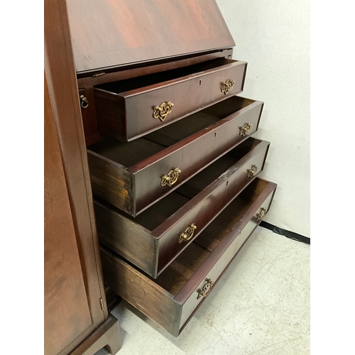 276 - FLAMED MAHOGANY ASTRICAL GLAZED BUREAU BOOKCASE WITH FITTED INTERIOR H80” W28” D19”