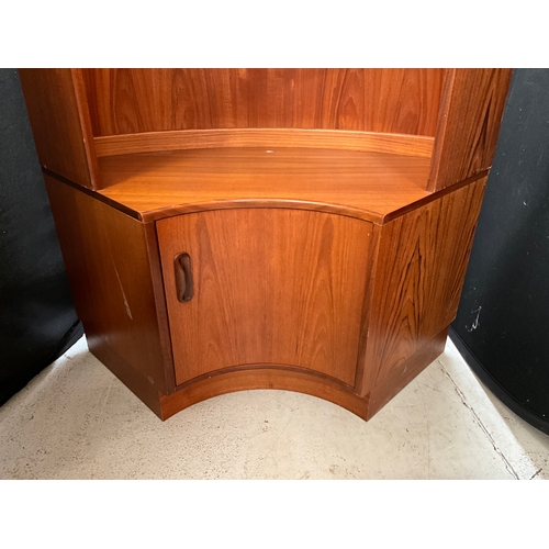 312 - RETRO TEAK BADGED G PLAN CORNER UNIT WITH OPEN SHELVES TO TOP OVER SINGLE DOOR TO BASE 
H78” W42” D3... 