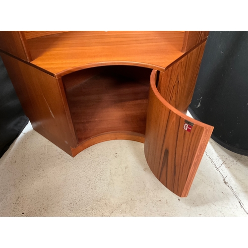 312 - RETRO TEAK BADGED G PLAN CORNER UNIT WITH OPEN SHELVES TO TOP OVER SINGLE DOOR TO BASE 
H78” W42” D3... 