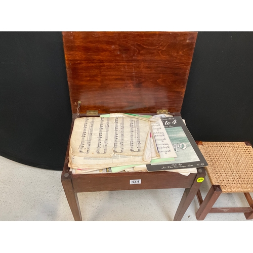 344 - VINTAGE OAK PIANO STOOL AND CONTENTS AND FOOTSTOOL