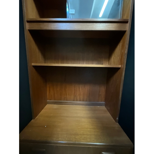 317 - RETRO TEAK BADGED G PLAN LOUNGE UNIT WITH SLIDING GLASS DOORS OVER OPEN SHELVES AND 3DRAWERS TO BASE... 