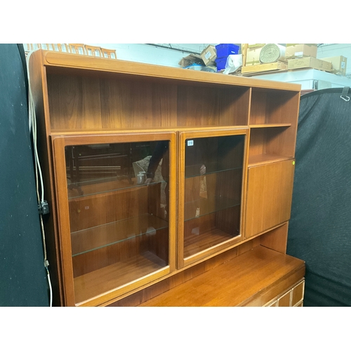 318 - RETRO TEAK BADGED MCINTOSH LOUNGE UNIT WITH 2 GLASS DOORS OPEN SHELVES AND DRINKS COMPARTMENT TO TOP... 