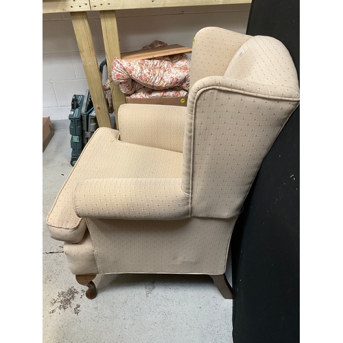 356 - UPHOLSTERED WINGBACK FIRESIDE ARMCHAIR ON CABRIOLE LEGS