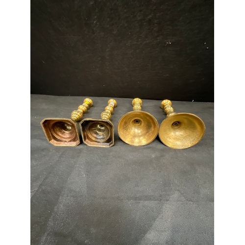 25 - THREE PAIRS OF BRASS CANDLE STICKS