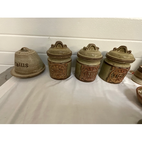 81 - STUDIO POTTERY TEASET AMD STORAGE JARS