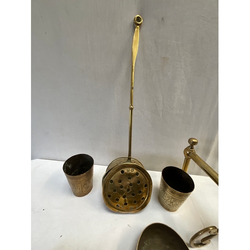 102 - COLLECTION OF BRASS TO INCLUDE FIRE DOGS,CHESTNUT ROASTER, BELL ETC