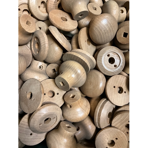 111 - TWO CRATES OF WOODEN KNOBS