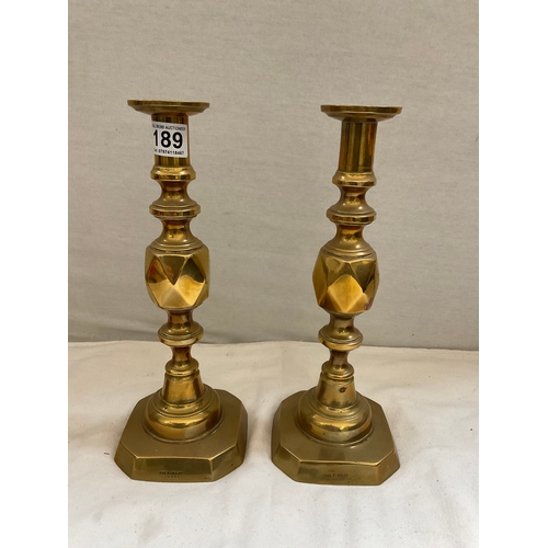 189 - LARGE PAIR OF VICTORIAN BRASS KING OF DIAMONDS CANDLESTICKS H12” AND A SMALLER PAIR OF VICTORIAN BRA... 