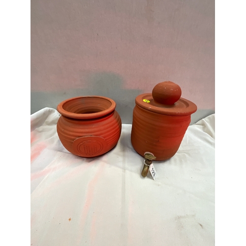 123 - TWO TERRACOTTA POTS HANDCRAFTED IN AUSTRALIA LARGEST H11” DIA 8”