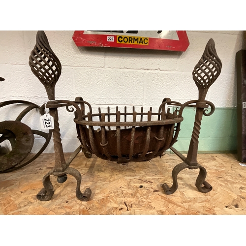 223 - VINTAGE DECORATIVE CAST IRON FIRE DOGS AND BASKET D14”