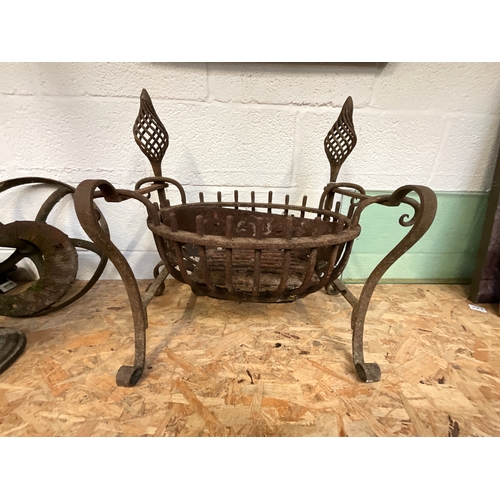 223 - VINTAGE DECORATIVE CAST IRON FIRE DOGS AND BASKET D14”