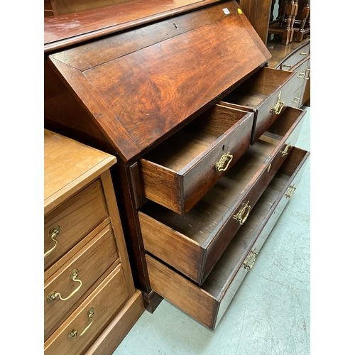 342 - GEORGIAN MAHOGANY BUREAU WITH FITTED INTERIOR AND 4 DRAWERS TO BASE A/F H41”W43”D22”