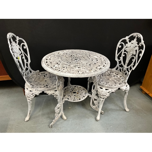 369 - DECORATIVE METAL GARDEN CIRCULAR TABLE AND 2 MATCHING CHAIRS H26”DIA25”