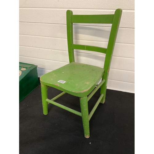 419 - CHILDS PAINTED CHAIR WORMED AND A CHILDS TABLE TOP DESK WITH CONTENTS TO INCLUDE DOLLS HOUSE CLASS R... 