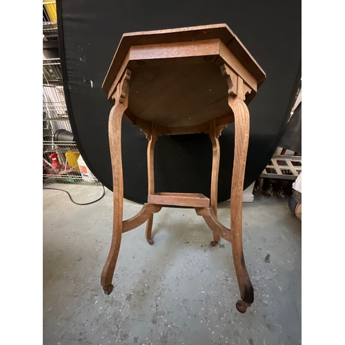 423 - EDWARDIAN OAK OCTAGON TOPPED WINDOW TABLE WITH SHELVE ON CASTOR FEET A/F H28”DIA25”