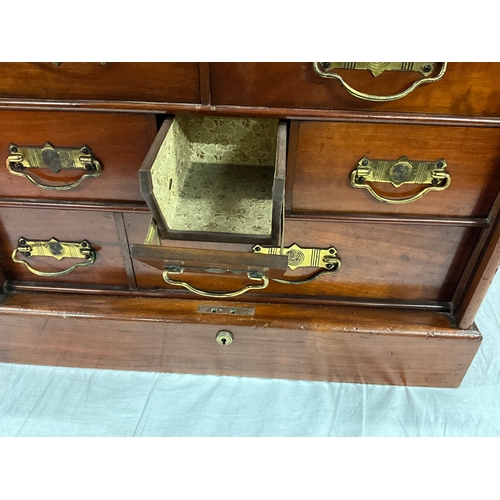 382 - EDWARDIAN MAHOGANY BANK OF DRAWERS WITH CAMBER FRONT , INTERIOR FITTED WITH 12 DRAWERS ALL WITH FOLD... 