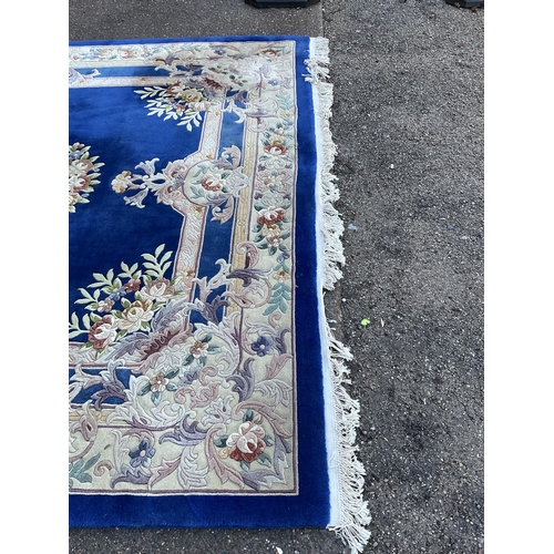 243 - GOOD QUALITY BLUE PATTERNED CARPET 149” x 108