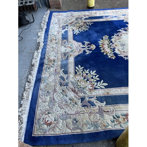 243 - GOOD QUALITY BLUE PATTERNED CARPET 149” x 108