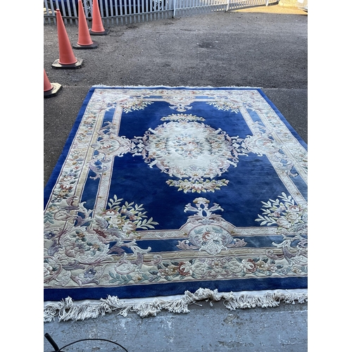 243 - GOOD QUALITY BLUE PATTERNED CARPET 149” x 108