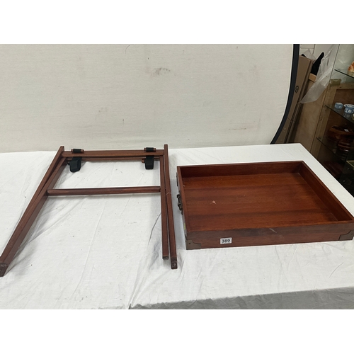 389 - MAHOGANY SERVING TRAY WITH BRASS HANDLES AND FOLDING STAND H29” W23” D23”