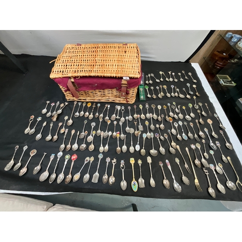 462 - COLLECTION OF SOUVENIR SPOONS IN PICNIC BASKET