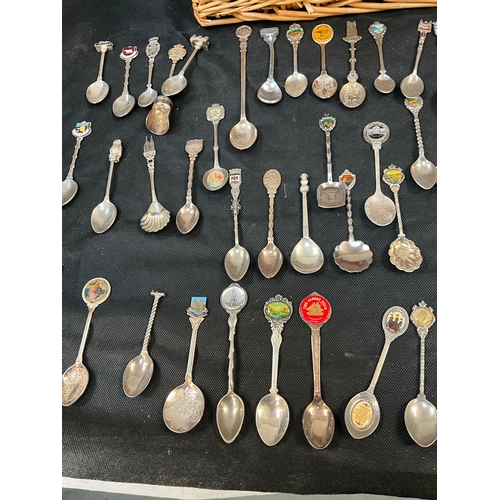 462 - COLLECTION OF SOUVENIR SPOONS IN PICNIC BASKET