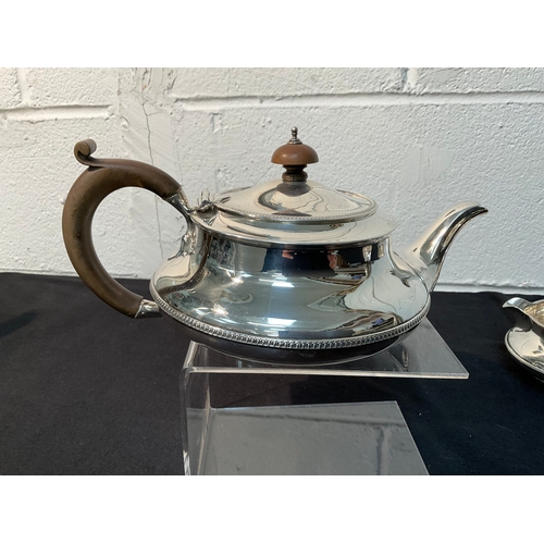 163 - 4 PIECE ART DECO HALLMARK SILVER STAMPED ALEXANDER & CLARK LONDON COMPRISING TEAPOT, COFFEE POT, SUG... 