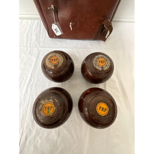 39 - SET OF FOUR VINTAGE WOODEN BOWLS IN CARRY BAG