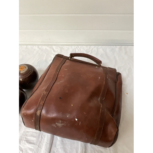 39 - SET OF FOUR VINTAGE WOODEN BOWLS IN CARRY BAG