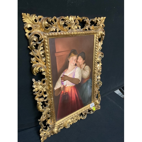 183 - GERMAN GILT FRAMED BERLIN PORCELAIN PLAQUE DEPICTING 2 MAIDENS BY CANDLE LIGHT,BEE HIVE MONOGRAM TO ... 