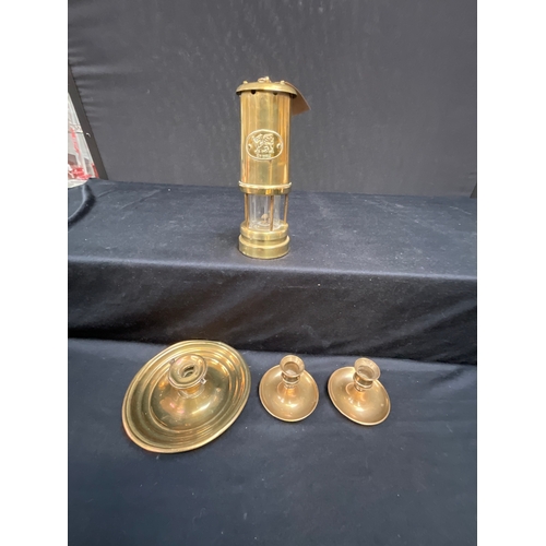 80 - REPRODUCTION MINERS BRASS LAMP AND BRASS CHAMBER STICKS