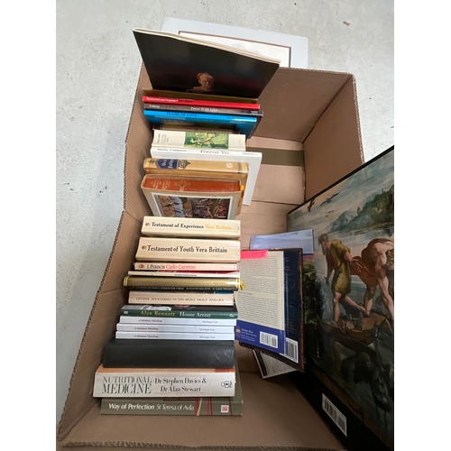 87 - TWO BOXES OF BOOKS AND CANDLES RELIGIOUS ITEMS