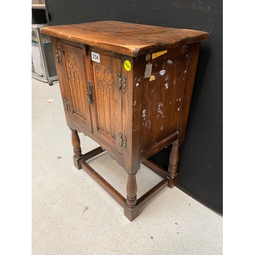 234 - OAK PRIORY STYLE CABINET WITH 2 DOORS ON STRETCHERED BASE A/F H27”W20”D13”