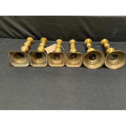 242 - 2 PAIRS OF VICTORIAN BRASS CANDLESTICKS AND A PAIR OF BRASS GEORGIAN CANDLESTICKS H9”