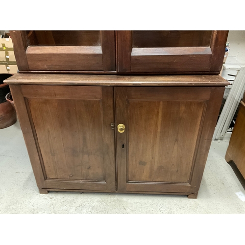 247 - GOTHIC REVIVAL PITCH PINE BOOKCASE WITH 2 GLAZED DOORS TO TOP AND 2 PANELLED DOORS TO BASE H90” W42”... 