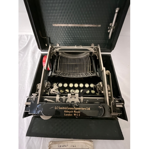 108 - VINTAGE CASED CORONA TYPEWRITER WITH BOOKLET