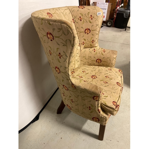 262 - EDWARDIAN MAHOGANY FRAMED UPHOLSTERED WING BACKED TUB CHAIR