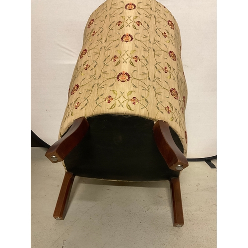 262 - EDWARDIAN MAHOGANY FRAMED UPHOLSTERED WING BACKED TUB CHAIR