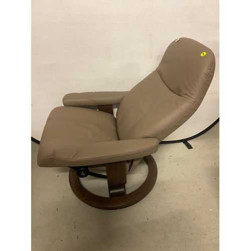 266 - STRESSLESS MUSHROOM COLOURED LEATHER SWIVEL AND RECLINING CHAIR COMPLETE WITH MATCHING FOOT STOOL