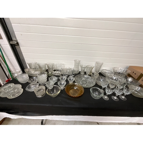 124 - TWO BOXES OF GLASSWARE TO INCLUDE BOWLS, VASES ETC