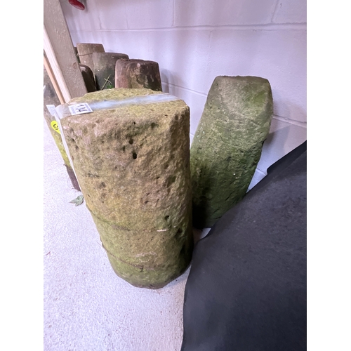 134 - TWO EARLY SANDSTONE SADDLE STONE BASES H22”