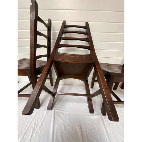 142 - SET OF FOUR SOLID OAK DINNING CHAIRS PLANKED SEATS